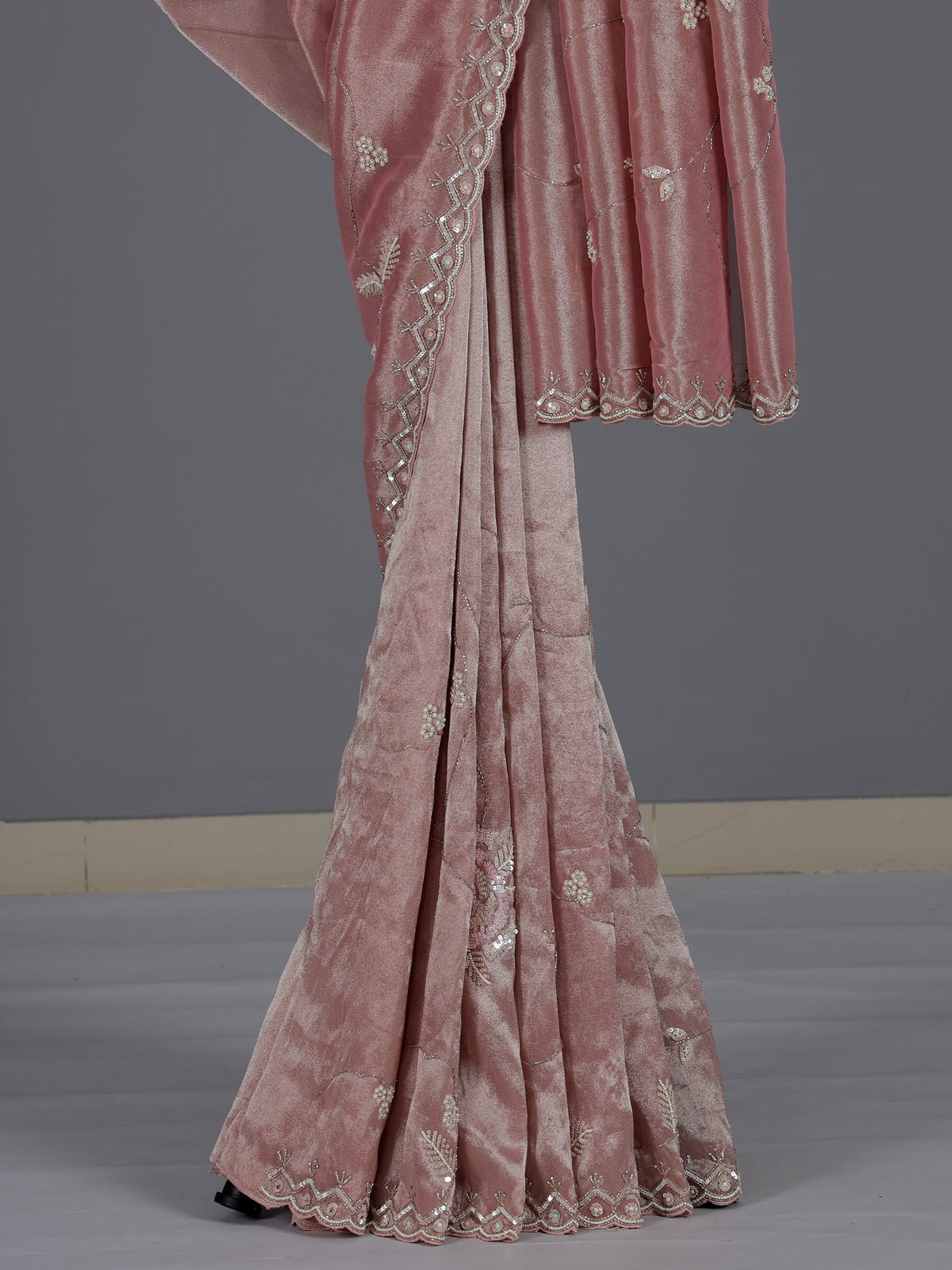 Stylish onion pink tissue silk saree for festive celebrations