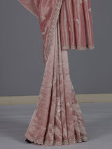 Stylish onion pink tissue silk saree for festive celebrations