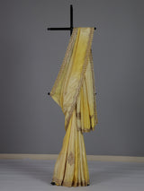 Traditional yellow shaded dola shimmer saree for haldi ceremony