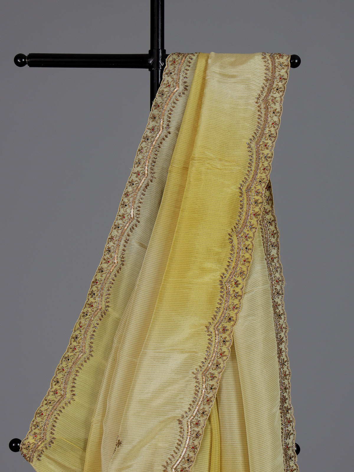 Traditional yellow shaded dola shimmer saree for haldi ceremony