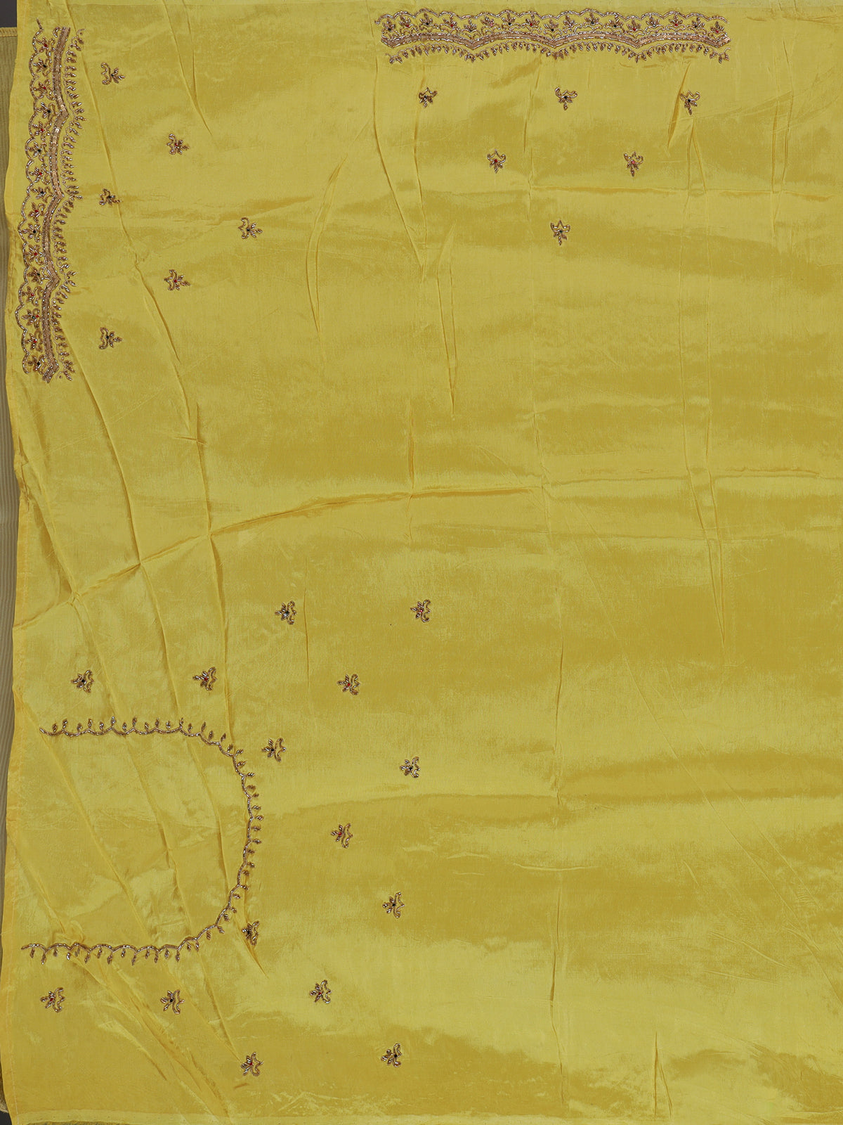 Traditional yellow shaded dola shimmer saree for haldi ceremony
