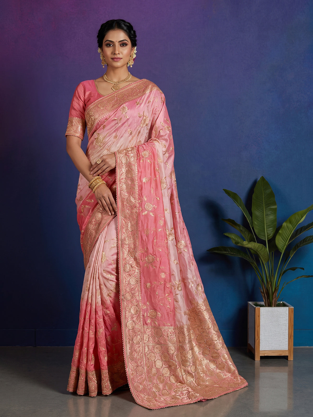 Beautiful pink shaded dola silk saree for wedding celebrations