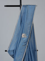 Stone blue shimmer dola silk designer saree with luxurious embellishments