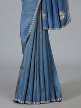 Stone blue shimmer dola silk designer saree with luxurious embellishments