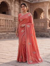 Pastel peach shimmer dola silk designer saree with radiant embellishments