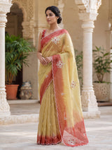 Yellow shaded tissue silk festive saree with graceful handcrafted elegance