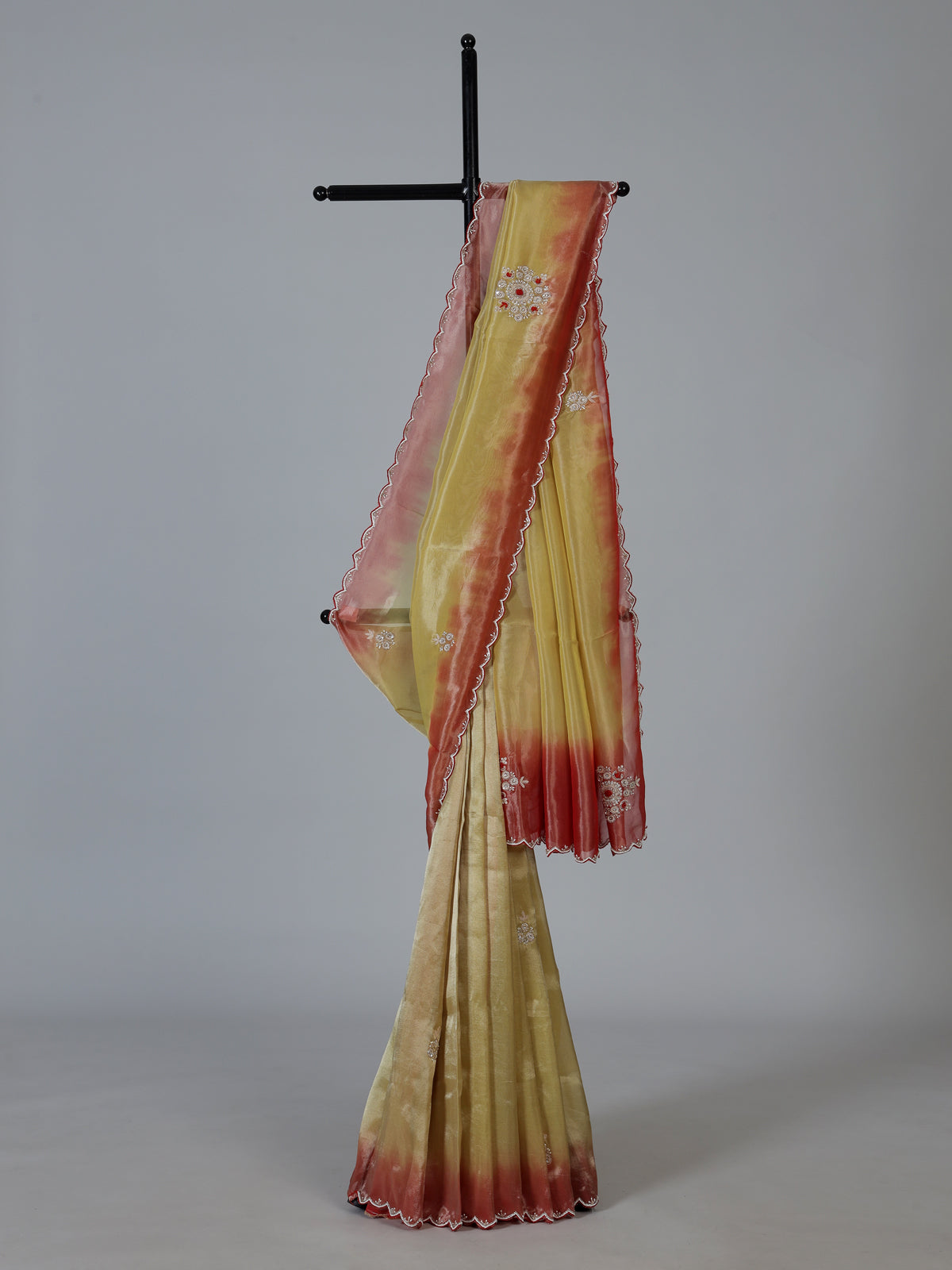 Yellow shaded tissue silk festive saree with graceful handcrafted elegance