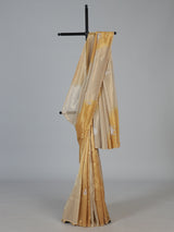 Golden and beige tissue silk festive saree with luxurious embellishments