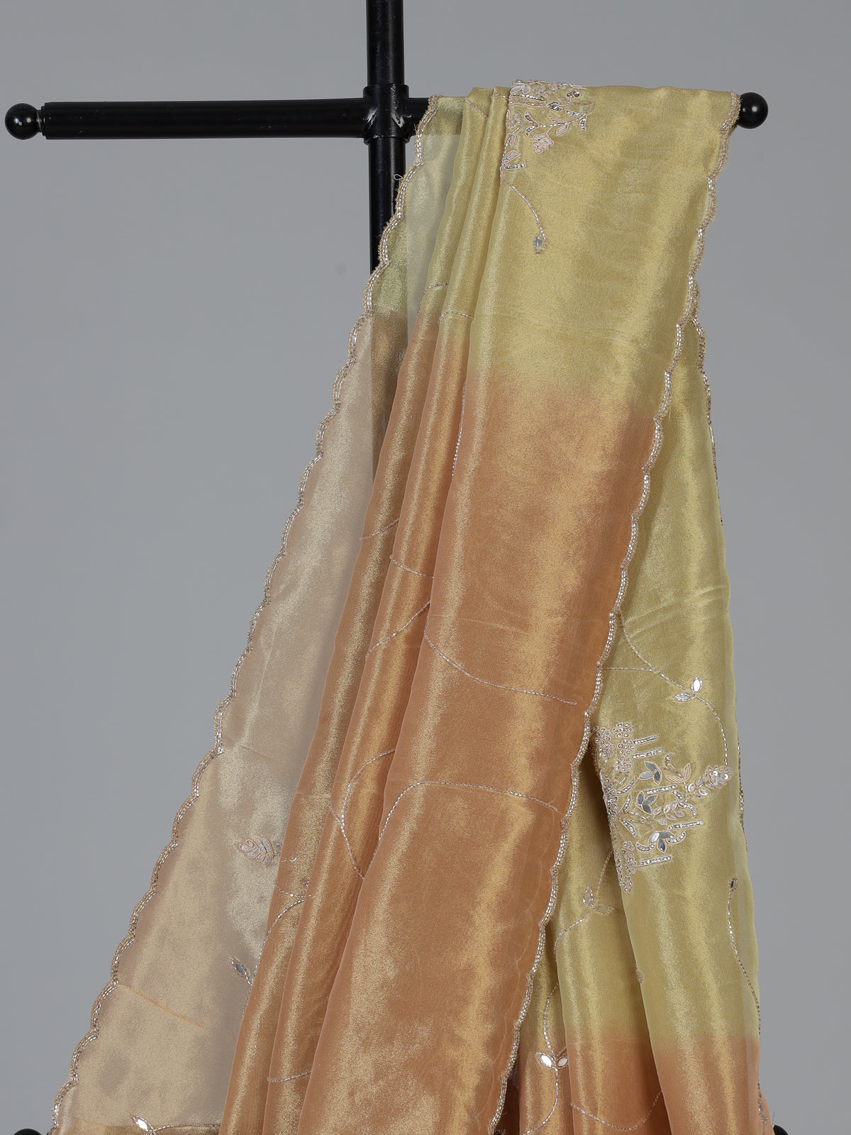 Pastel peach and green tissue silk designer festive saree with elegance