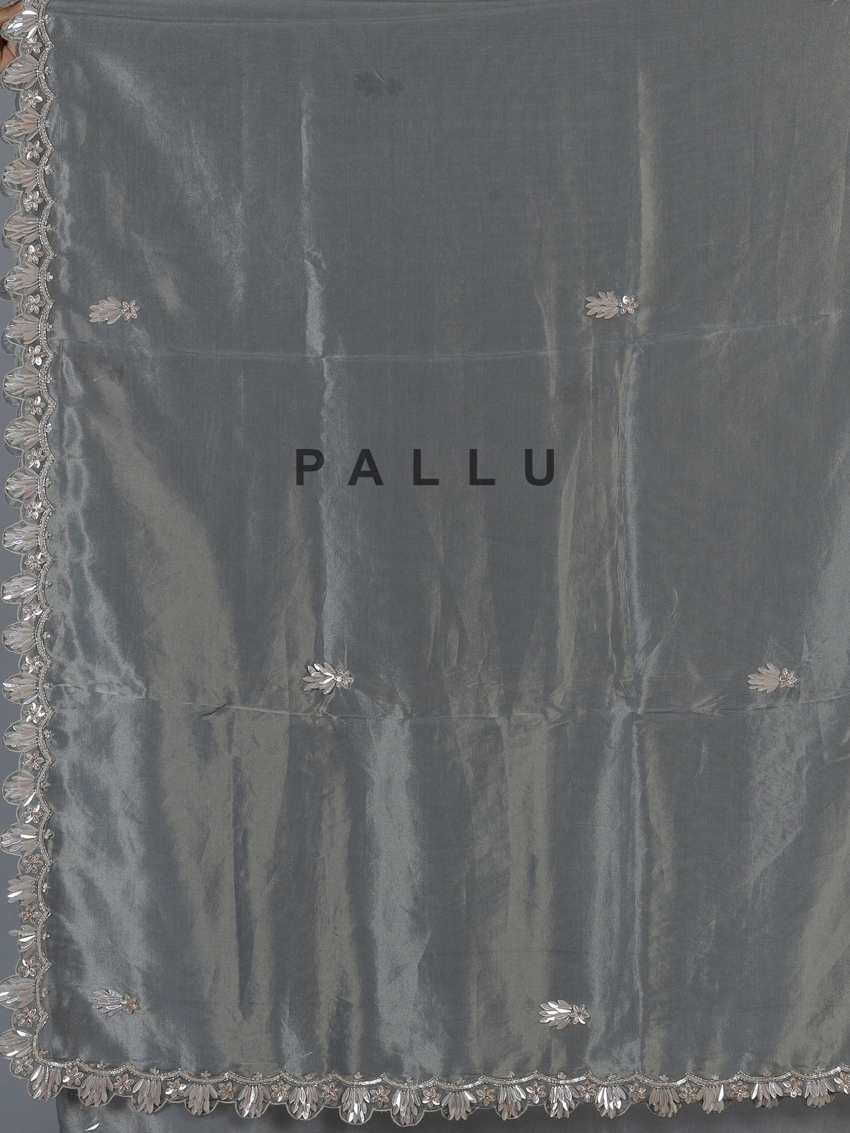 Pastel grey designer tissue silk saree with luxurious festive craftsmanship
