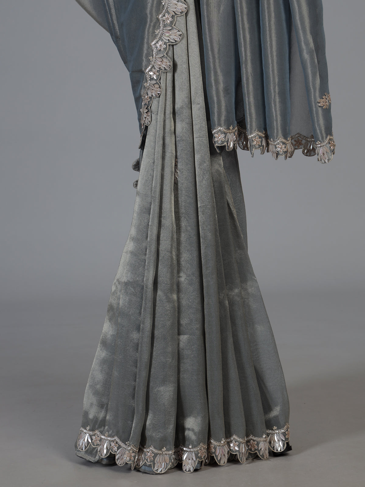 Pastel grey designer tissue silk saree with luxurious festive craftsmanship