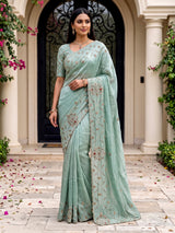 Pista green shimmer dola silk saree with elegant festive embellishments