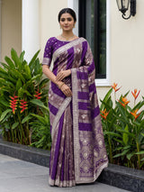 Purple dola silk designer saree with radiant festive