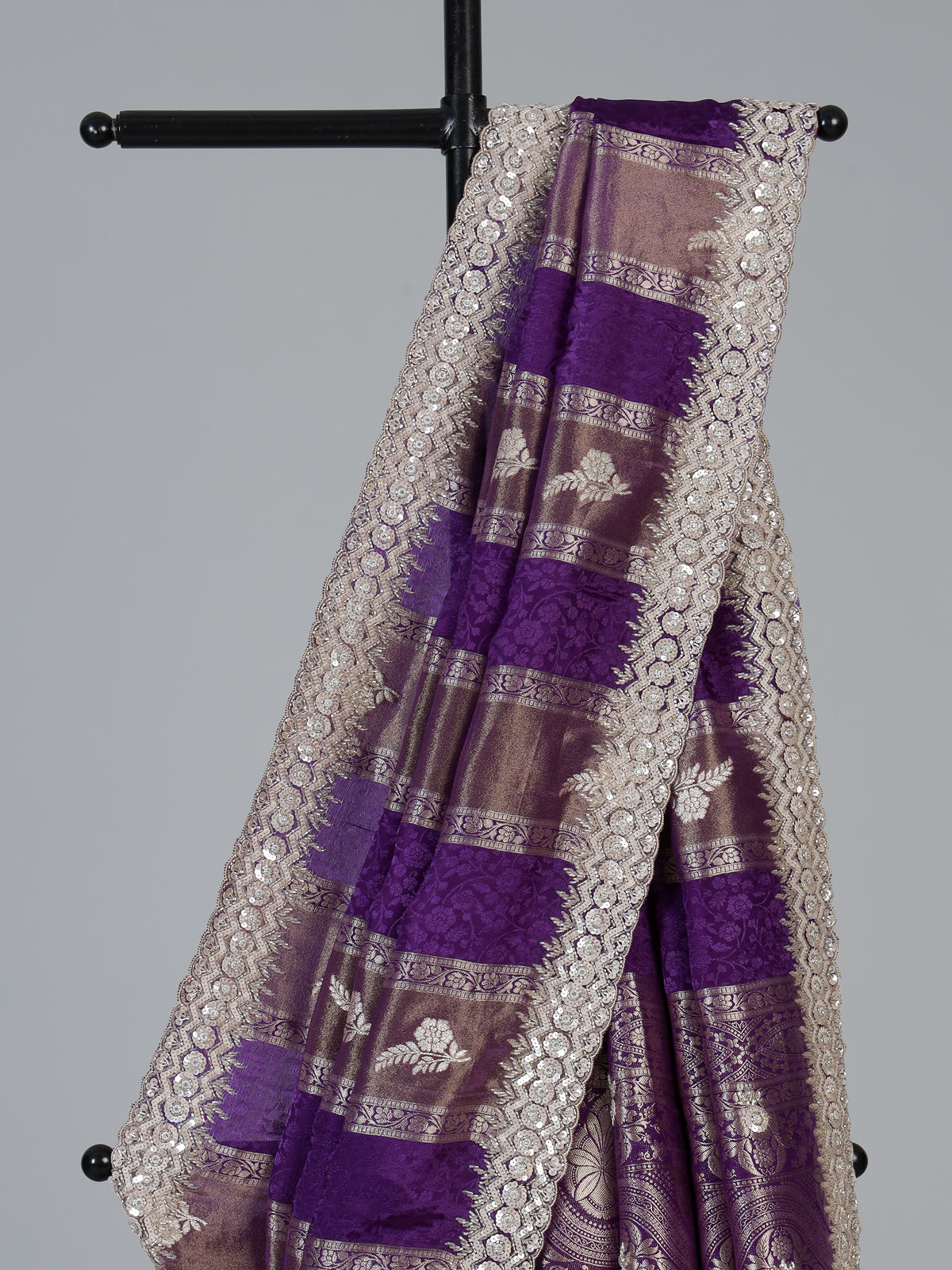 Purple dola silk designer saree with radiant festive