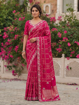 Rani pink dola silk elegant saree for festive and wedding celebrations