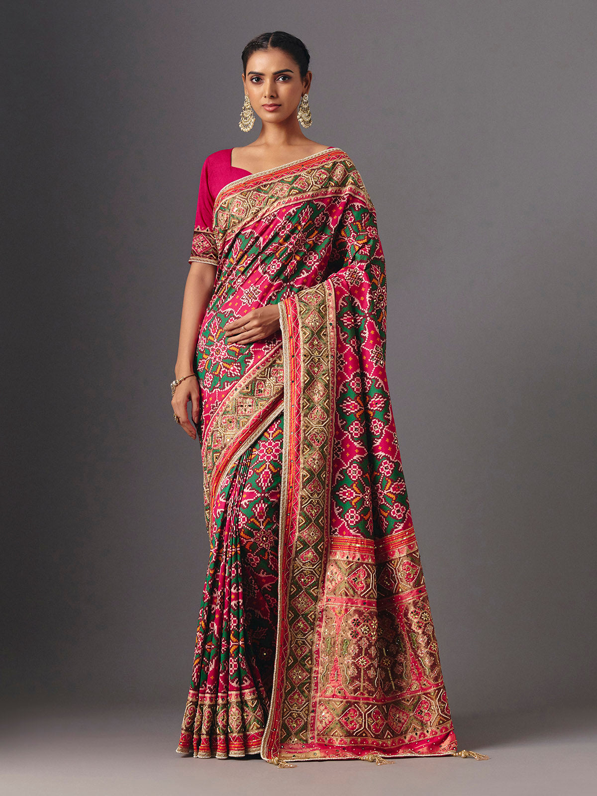 Rani pink art patola silk saree with graceful traditional elegance