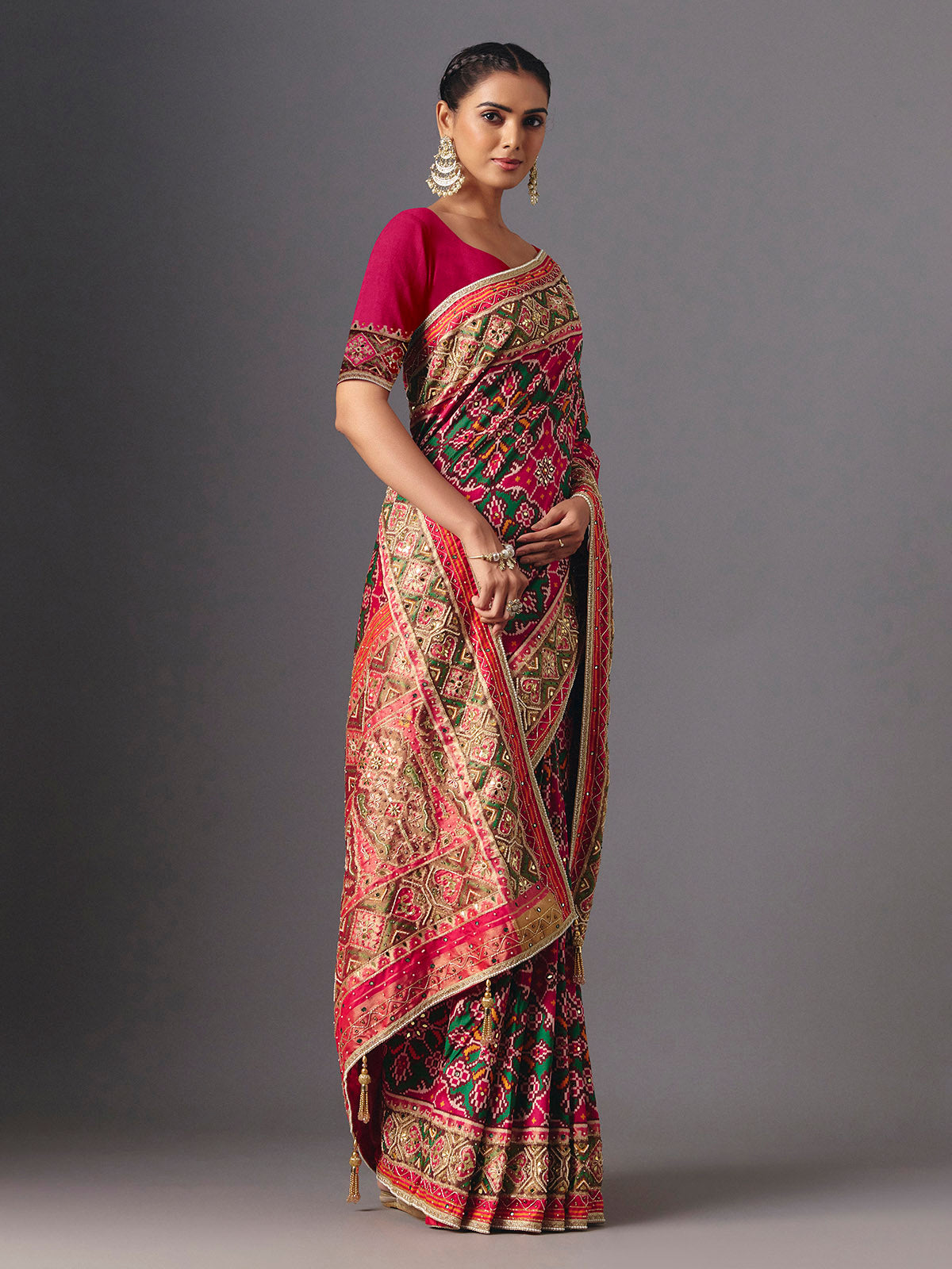 Rani pink art patola silk saree with graceful traditional elegance