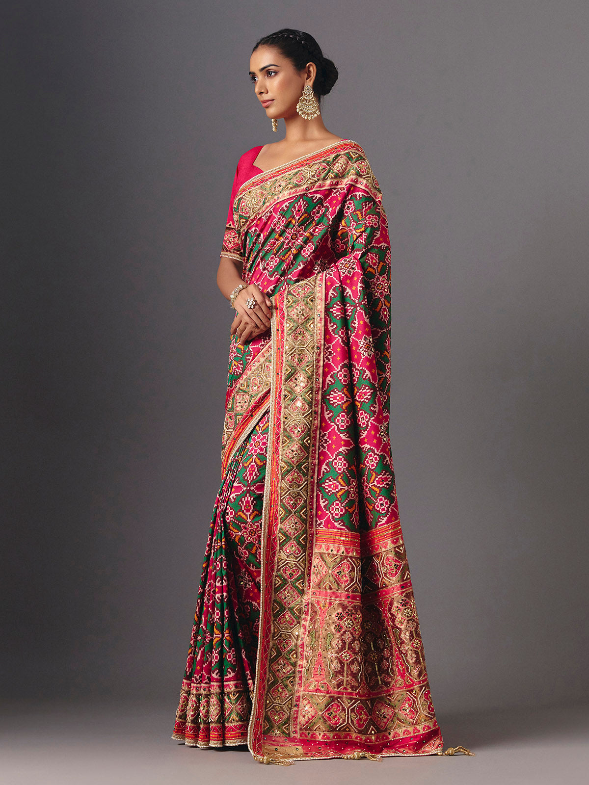 Rani pink art patola silk saree with graceful traditional elegance