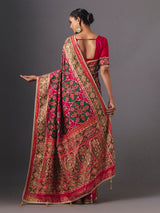 Rani pink art patola silk saree with graceful traditional elegance