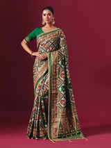 Green art patola silk saree with animal and bird motif artistry