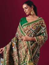 Green art patola silk saree with animal and bird motif artistry