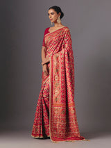 Red art silk patola saree with traditional animal and bird artistry