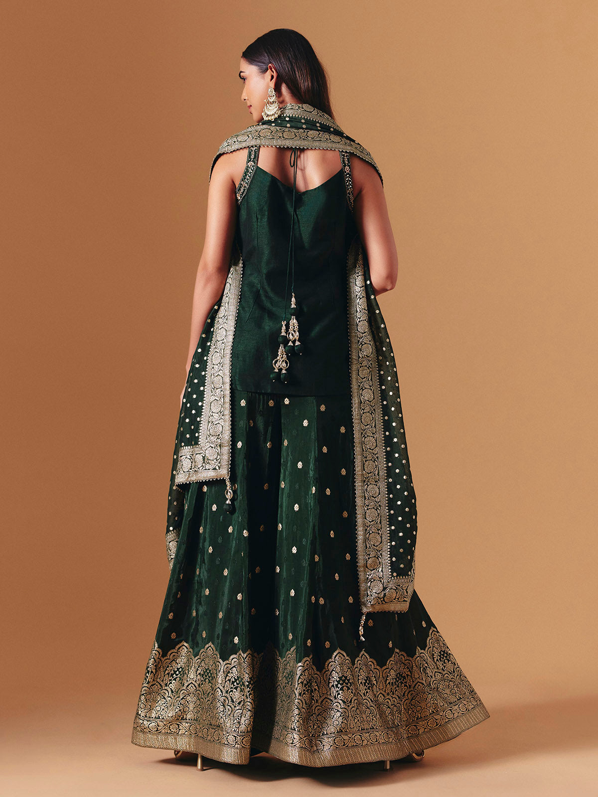 Green raw silk embroidered palazzo suit with elegant festive dupatta