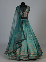 Teal green pichwai printed crepe silk lehenga choli ensemble
