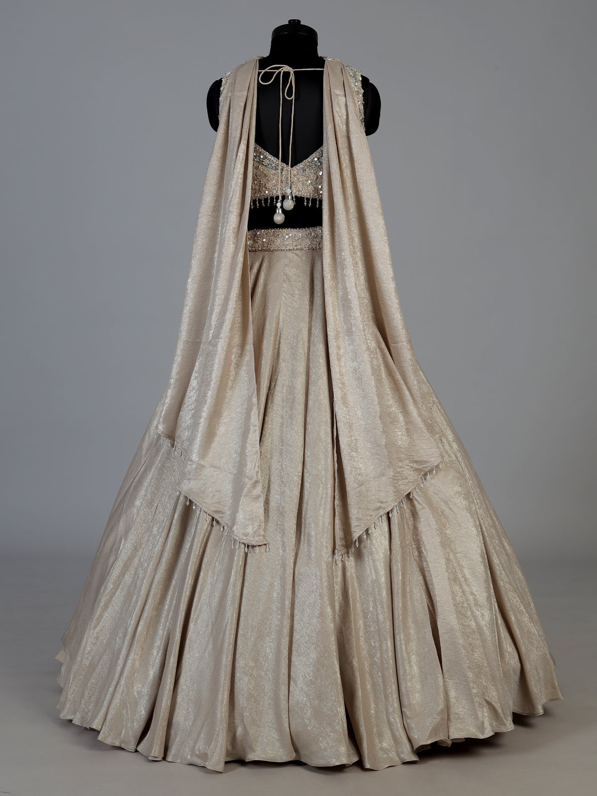 Gold tissue silk bridal lehenga with statement choker dupatta
