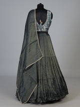 Bottle green tiered crepe silk designer lehenga creation