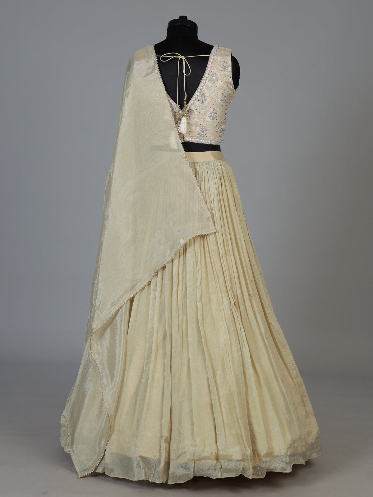 Cream metallic crepe silk designer wedding lehenga ensemble