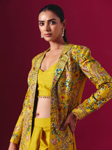 Mustard yellow silk jacket style indowestern suit with floral motifs for women