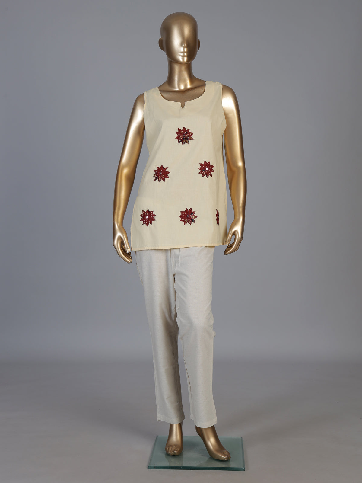 Cream cotton embroidered casual sleeveless sweetheart neck kurti
