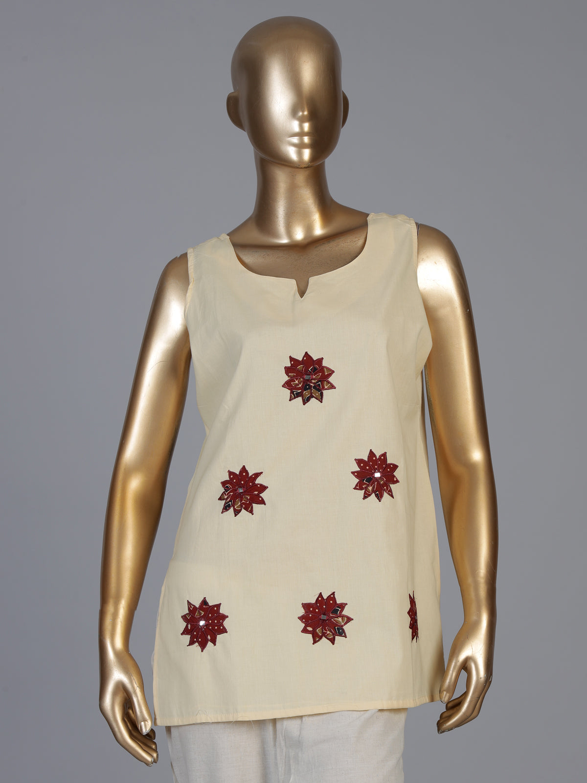 Cream cotton embroidered casual sleeveless sweetheart neck kurti