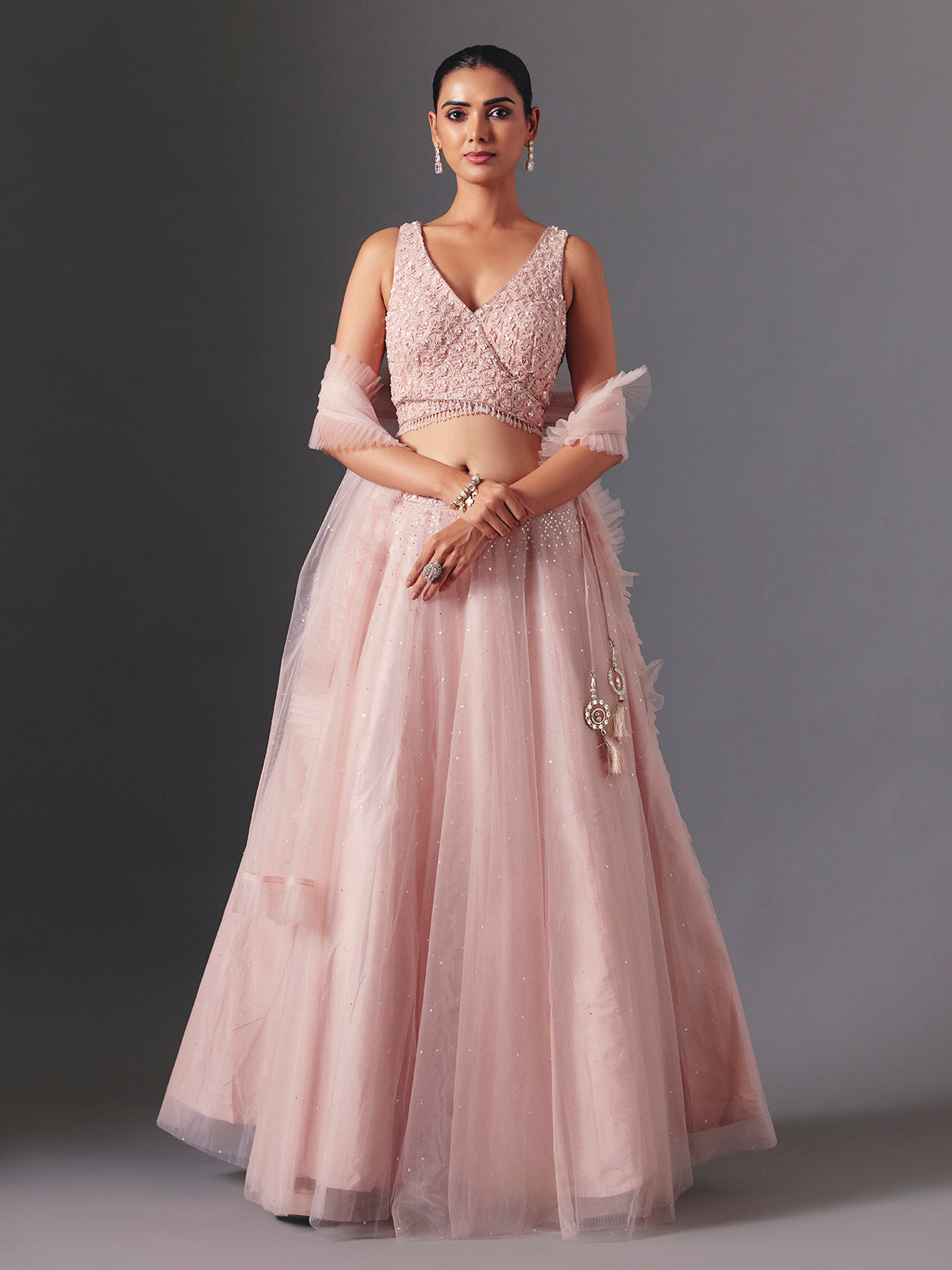 Onion pink net designer lehenga choli with elegant dupatta style
