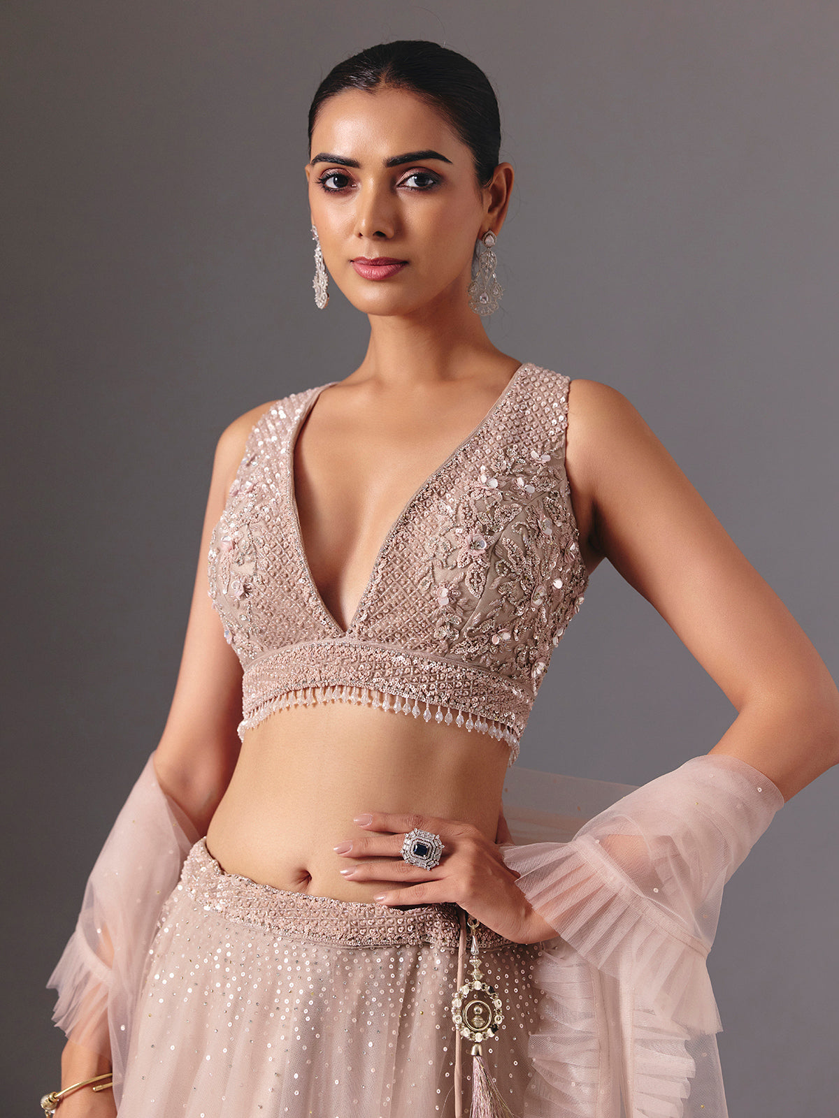 Beige net designer lehenga choli with elegant dupatta glamour style