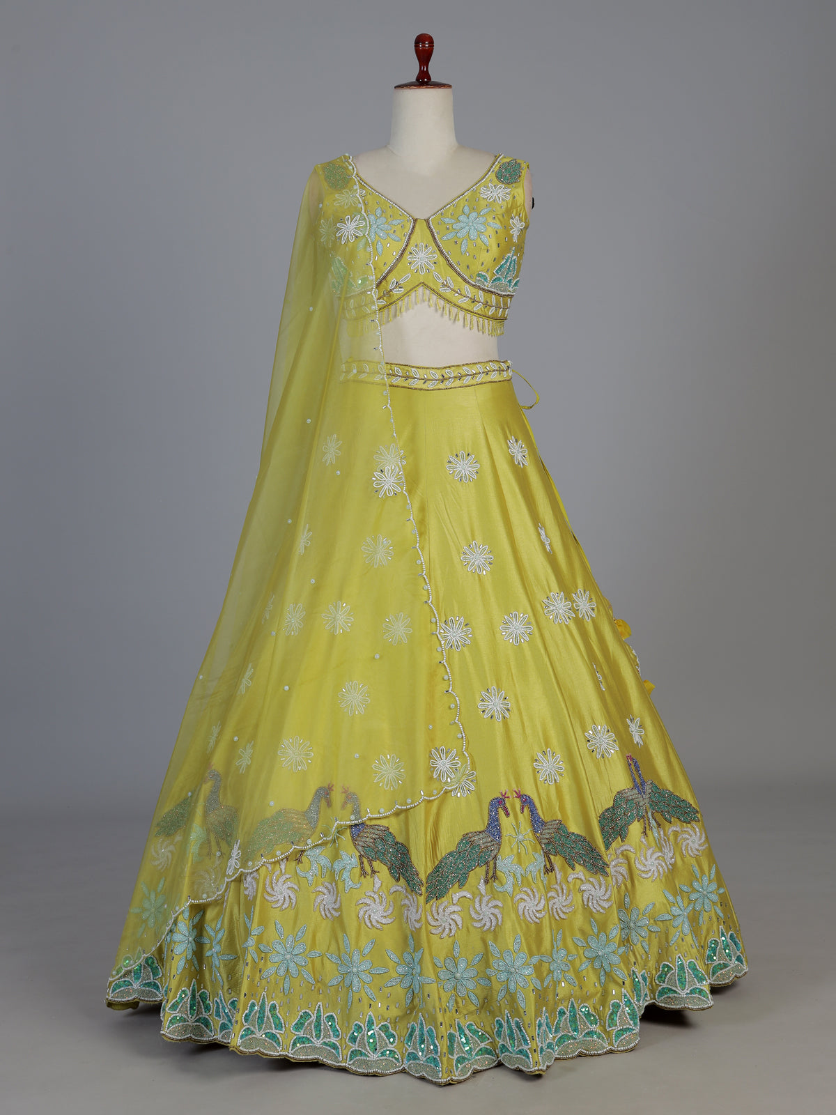 Yellow raw silk embroidered haldi lehenga attire