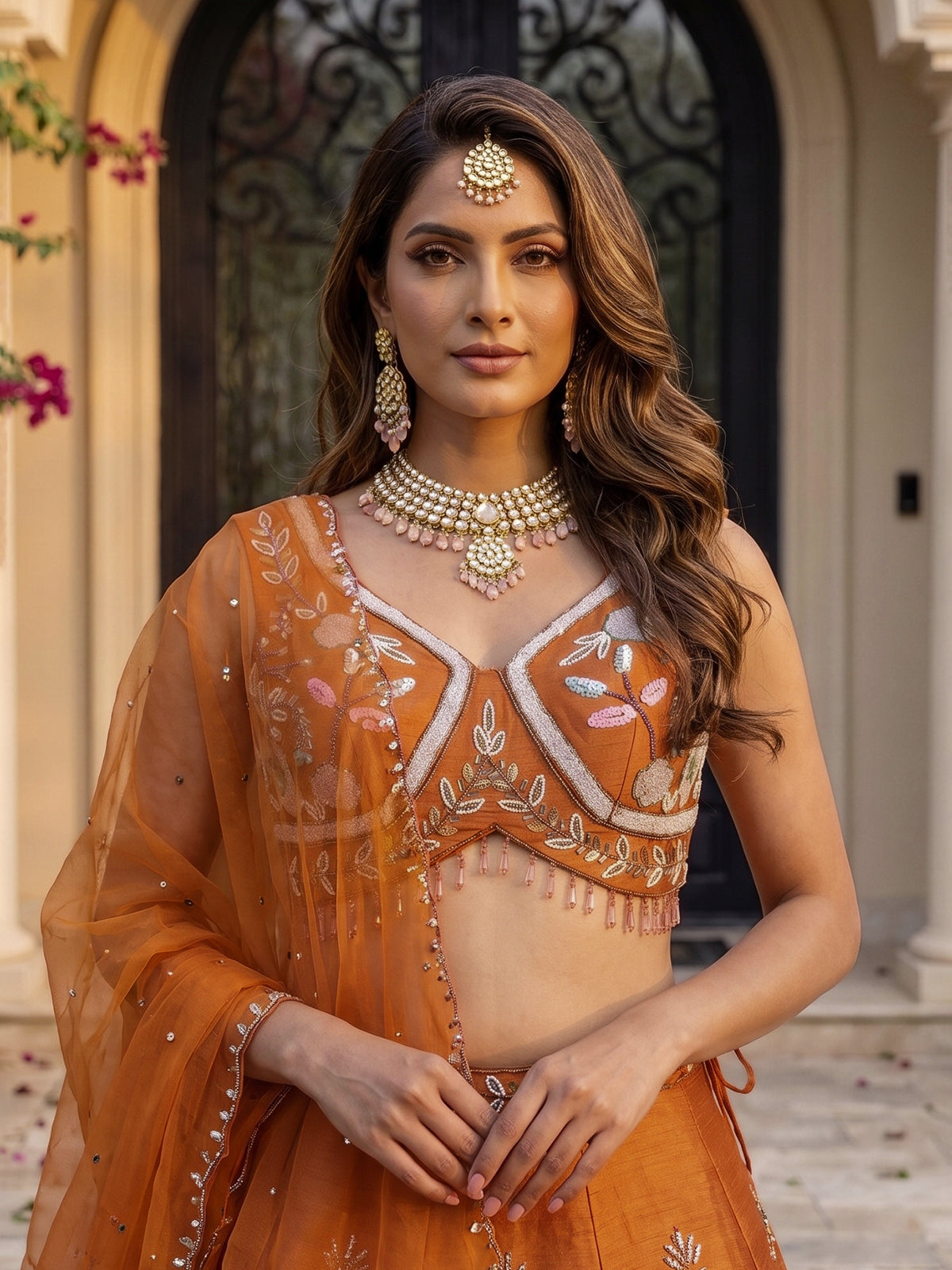 Rust orange raw silk swan motif lehenga choli with dupatta