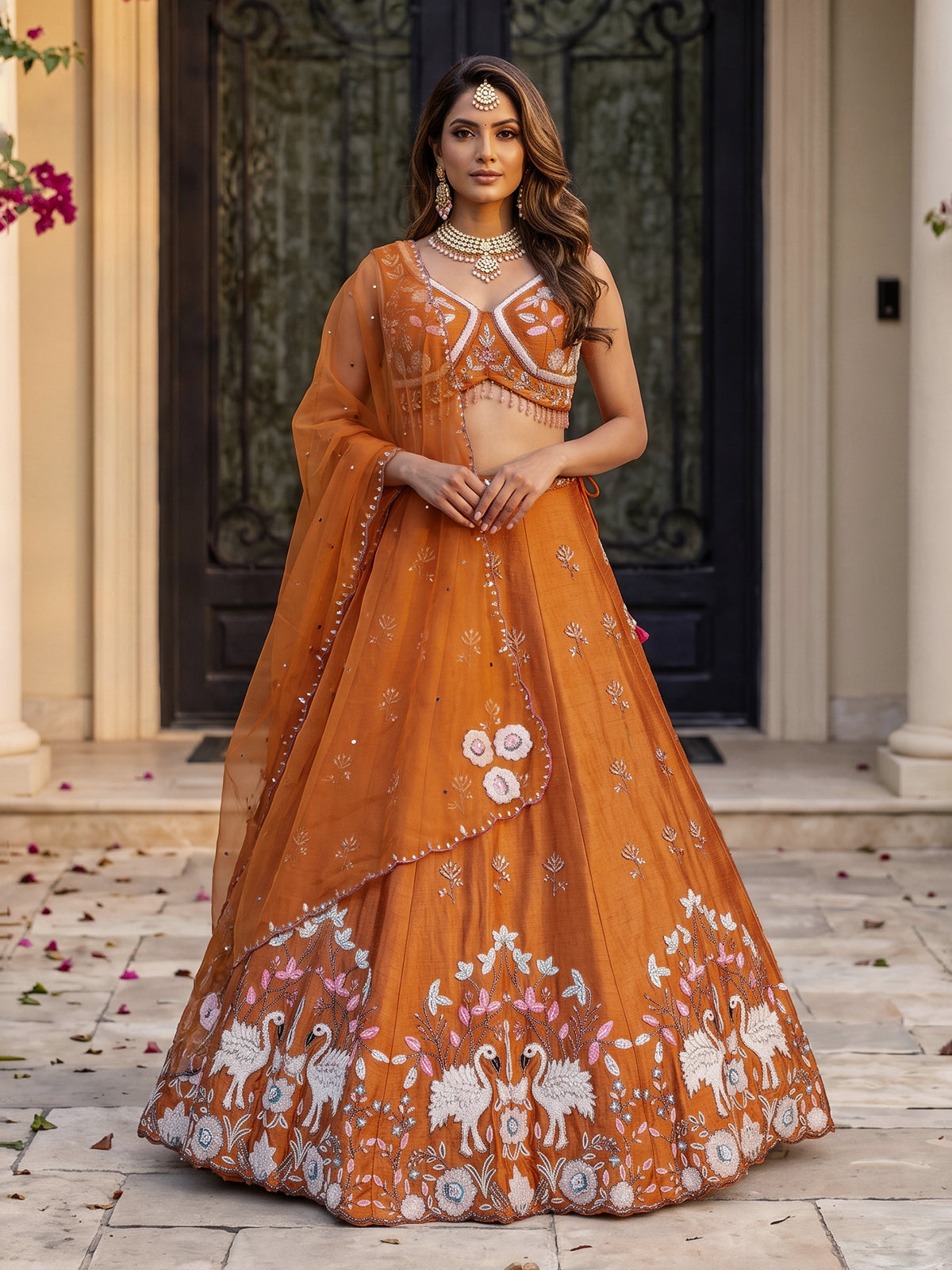 Rust orange raw silk swan motif lehenga choli with dupatta