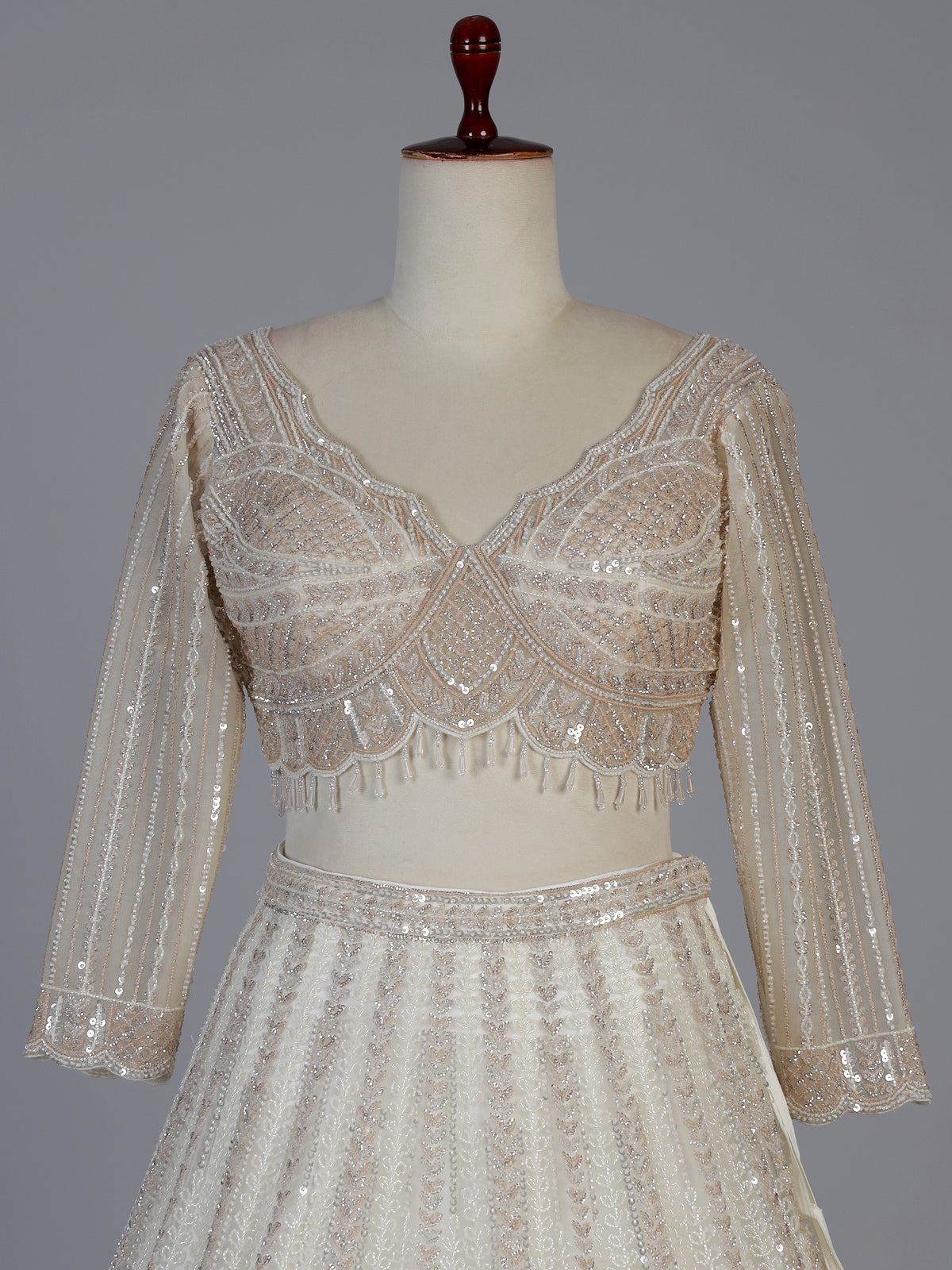 White net designer lehenga choli with embellished dupatta