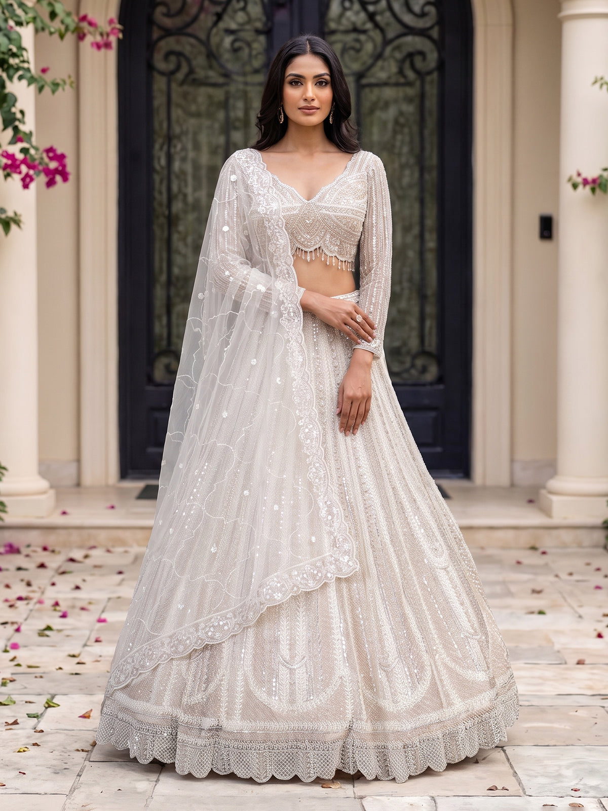 White net designer lehenga choli with embellished dupatta