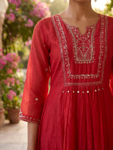 Rani pink tissue yoke kurti set with festive embellishments