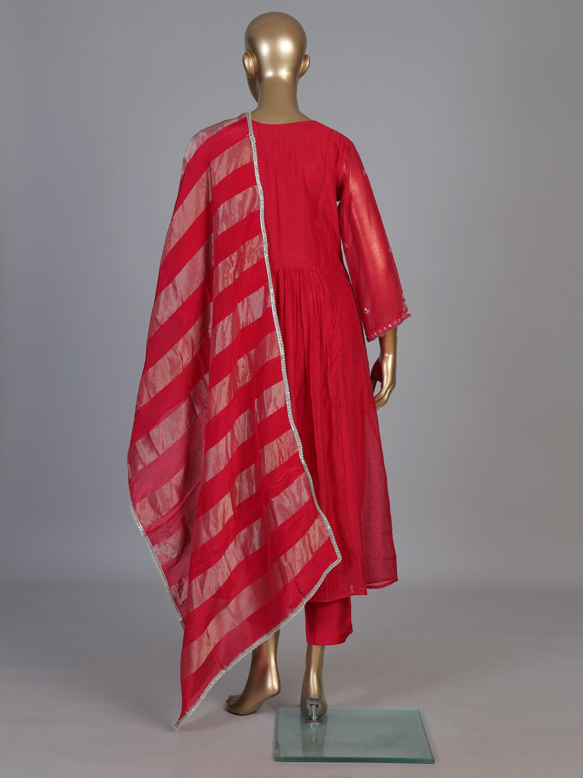 Rani pink tissue yoke kurti set with festive embellishments