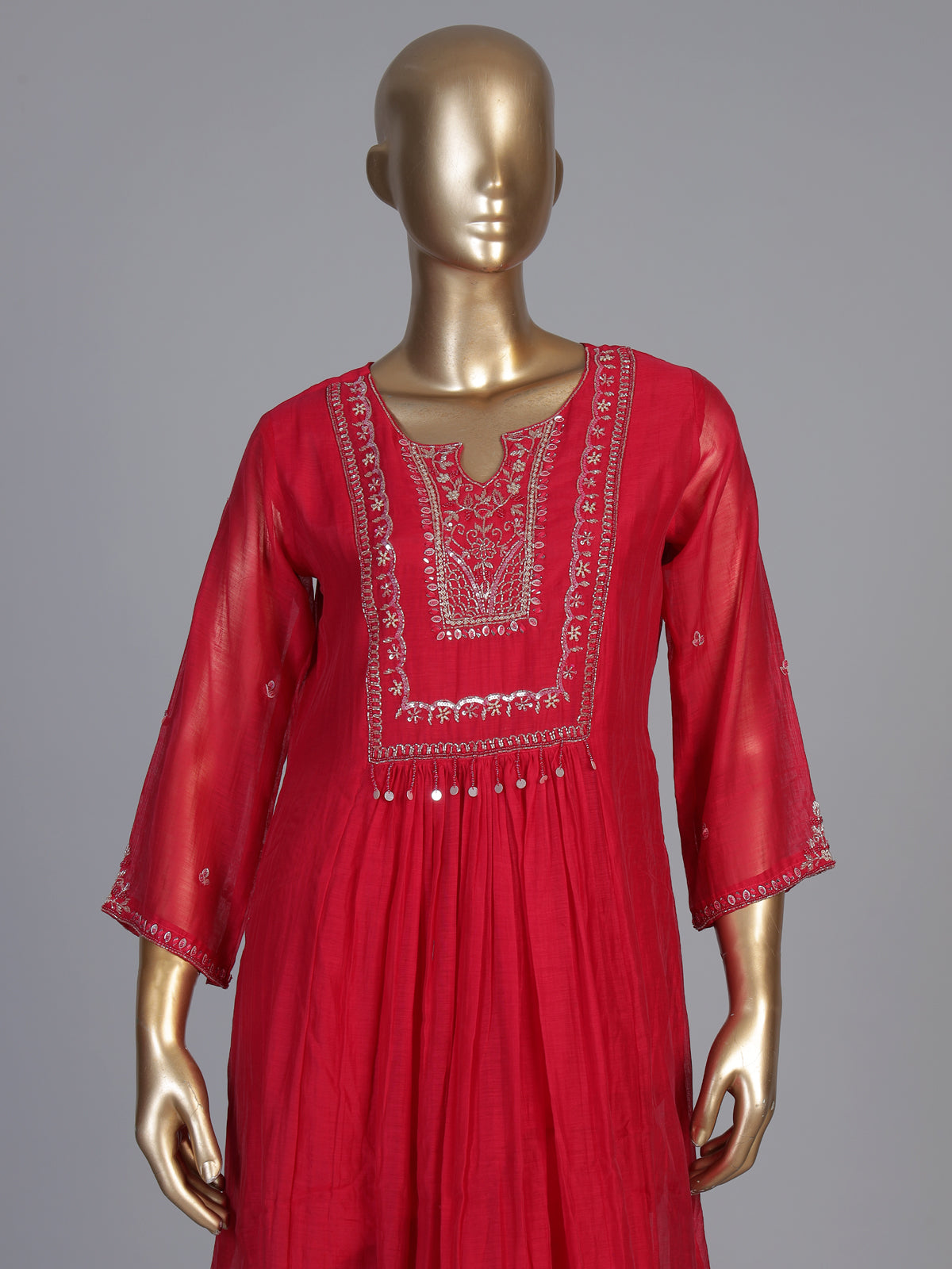 Rani pink tissue yoke kurti set with festive embellishments