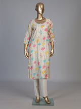 Cream silk floral printed kurti with graceful zari and aabla detailing