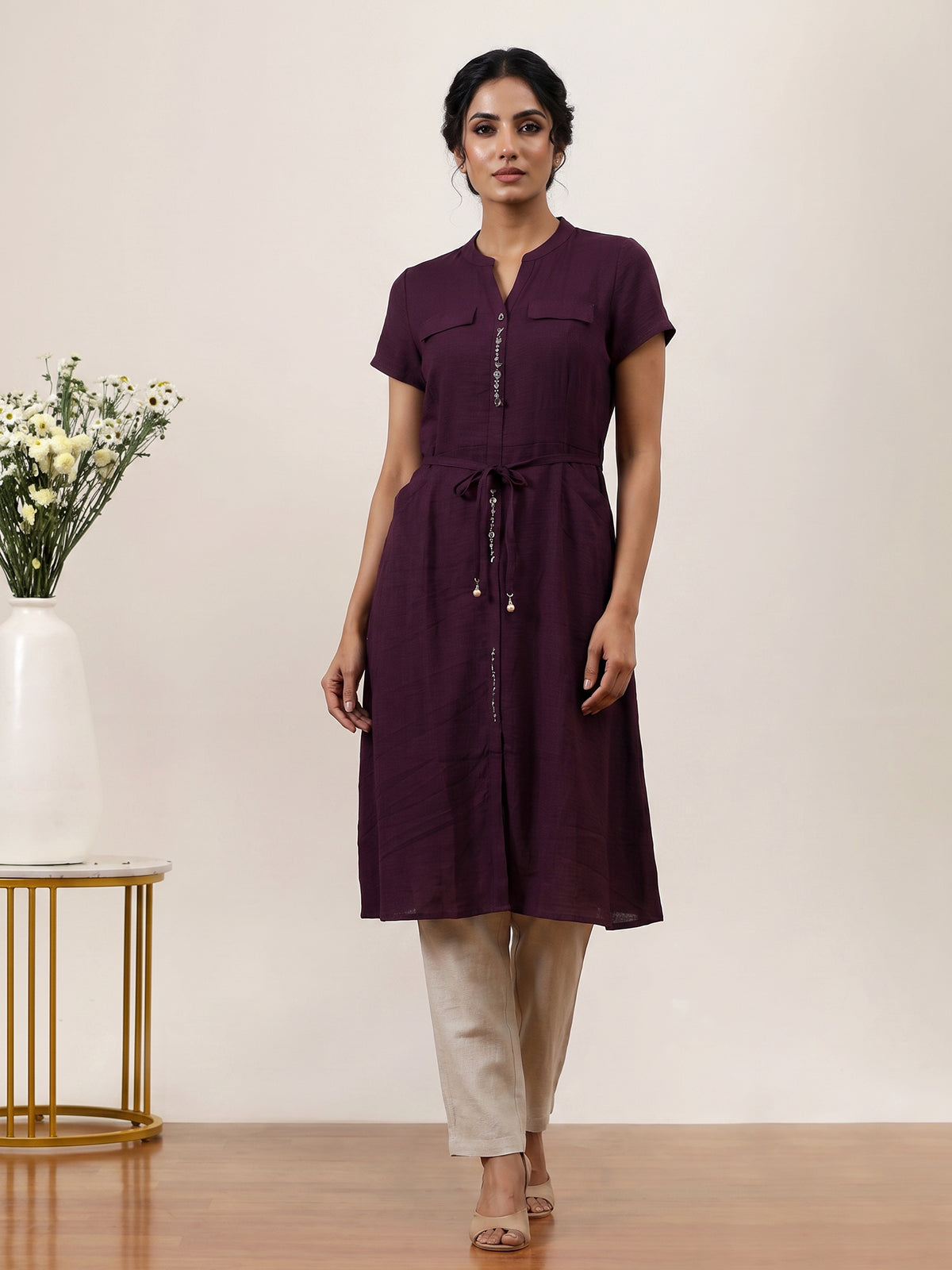 Wine silk designer kurti with stand collar and elegant waist belt