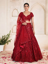 Maroon net designer lehenga choli with stone work tassel detailing