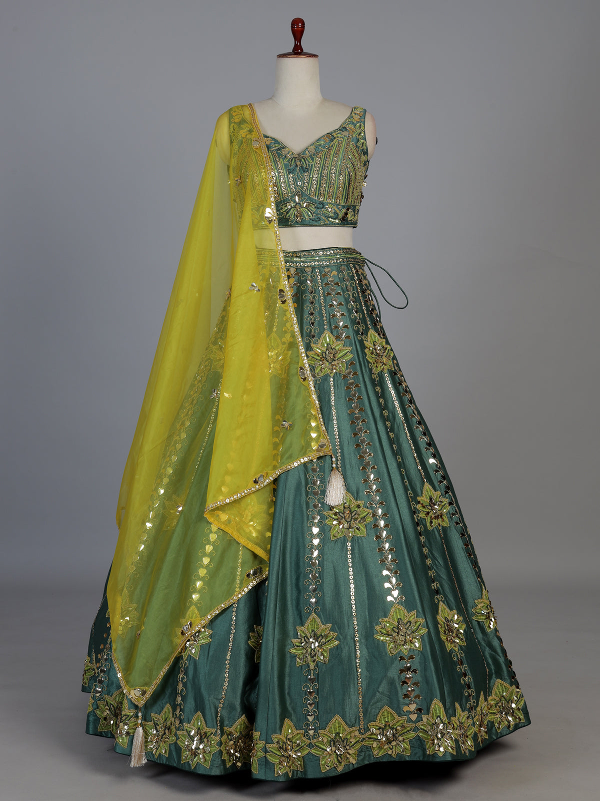 Green silk lehenga choli with mirror patchwork and contrast dupatta