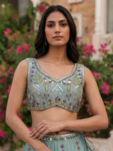 Light blue silk lehenga choli with pearls mirrors and zardosi work