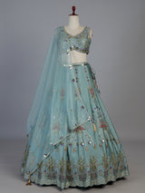Light blue silk lehenga choli with pearls mirrors and zardosi work